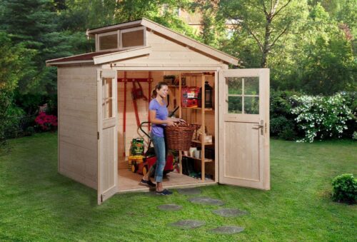 Weka Garden shed with a offset roof and skylights. The double door is open and inside stands a woman, holding various garden utensils.